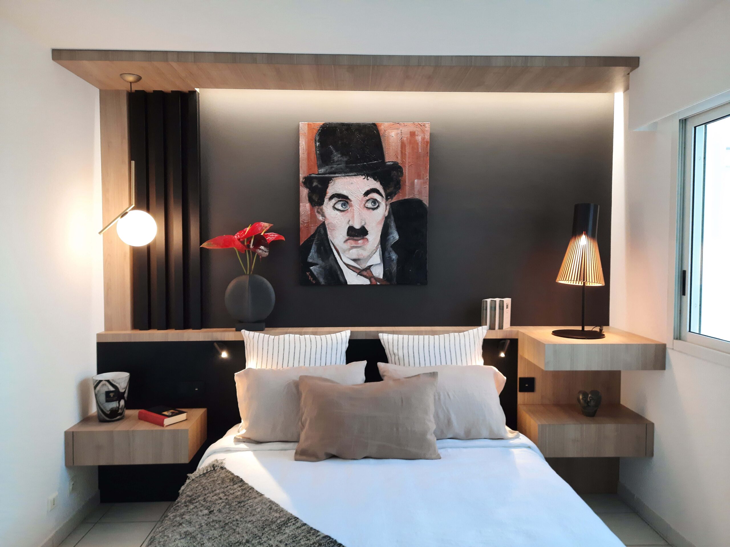 Aménagement sur-mesure d'une chambre réalisé par Grichka Interiors Design